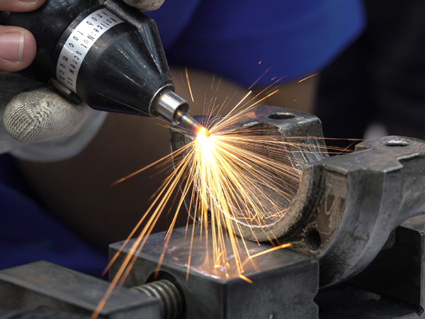 Close up handle grinding machine for polishing metal of automotive parts